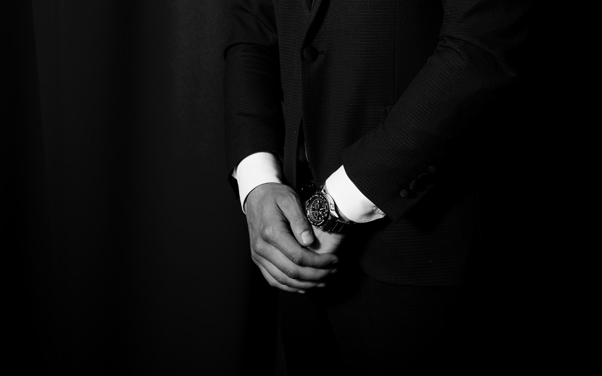 Ivas in a tuxedo, hands and watch